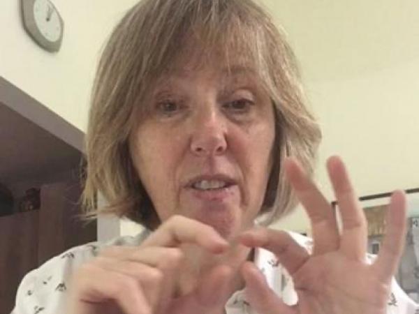 Woman communicating using sign language