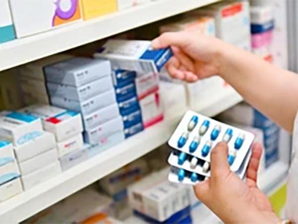 Pharmacist sorting medications